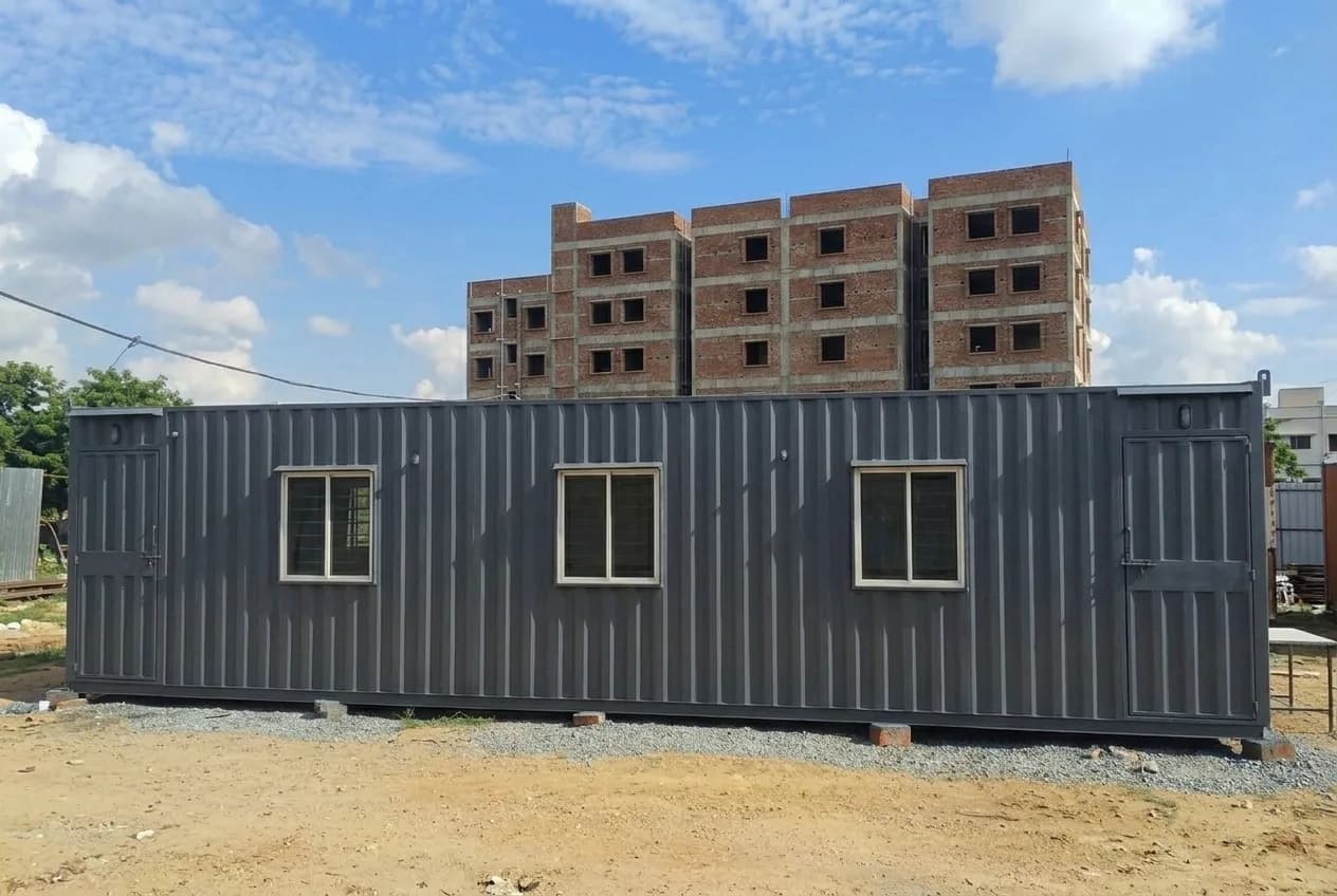 Front elevation of the 40 × 10 ft portable site office showing two doors and three windows