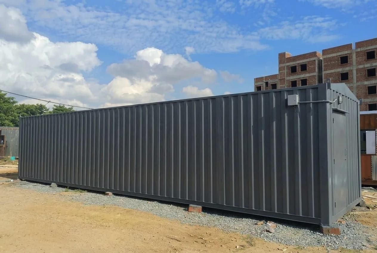 Angled rear view of the 40 × 10 ft portable site office showing its full length