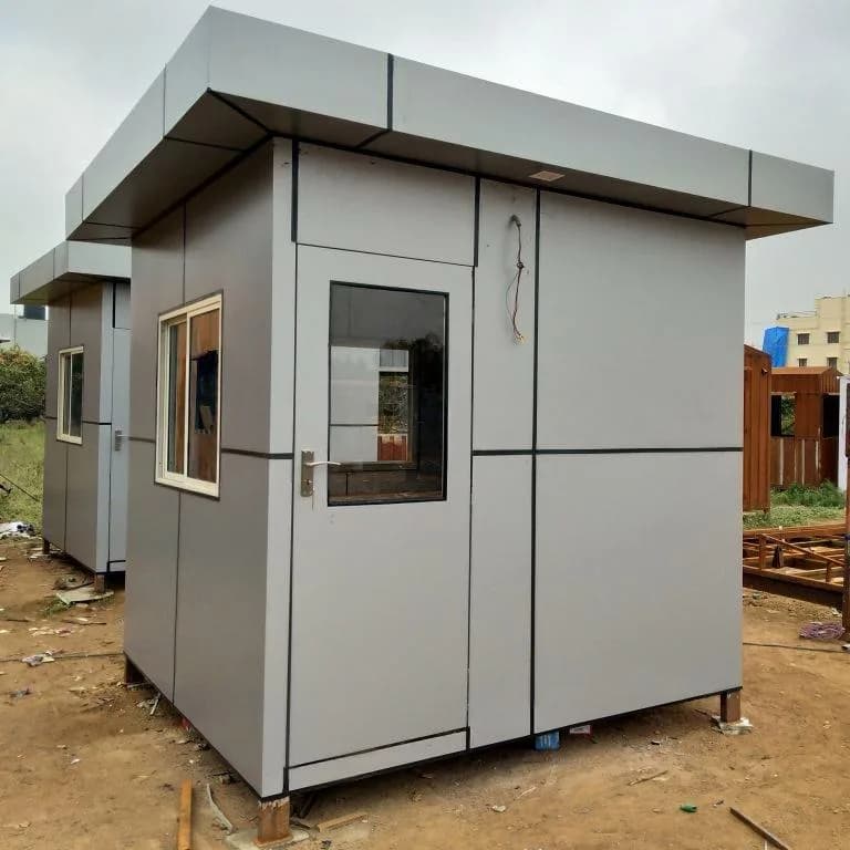 ACP Portable Security Cabin 8 × 8 ft exterior in grey ACP panel finish with entrance door and sliding window