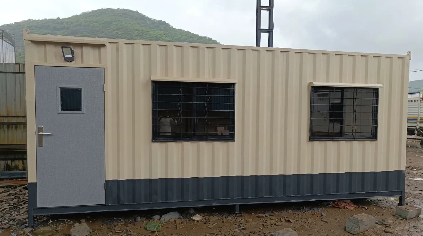 Portable labour accommodation cabin — 20 × 10 × 8.5 ft single-storey exterior with door and grilled windows, by Porta Cabin Systems